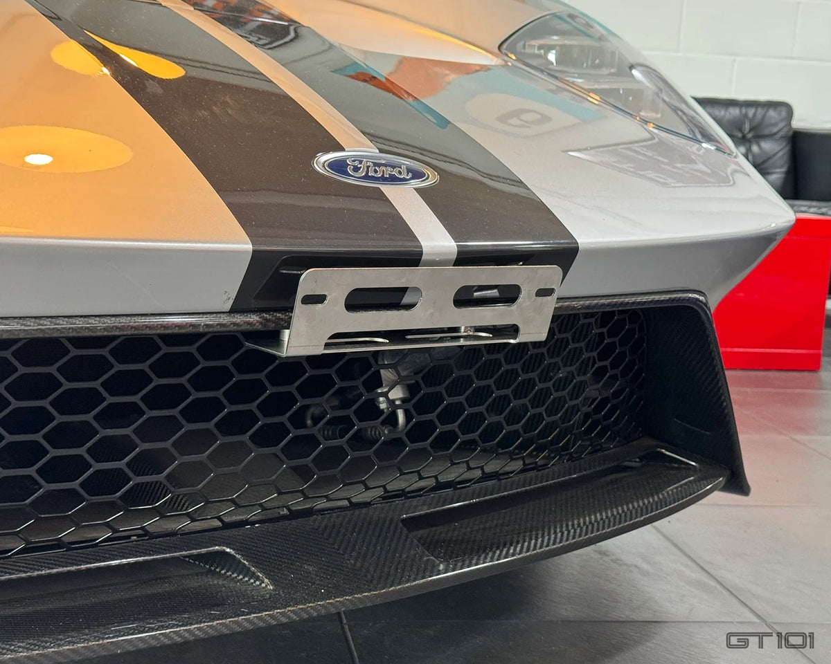 GT101 2016–2022 Ford GT front number plate mounting bracket manufactured in the UK from 2mm stainless steel shown on a Ford GT without number plate