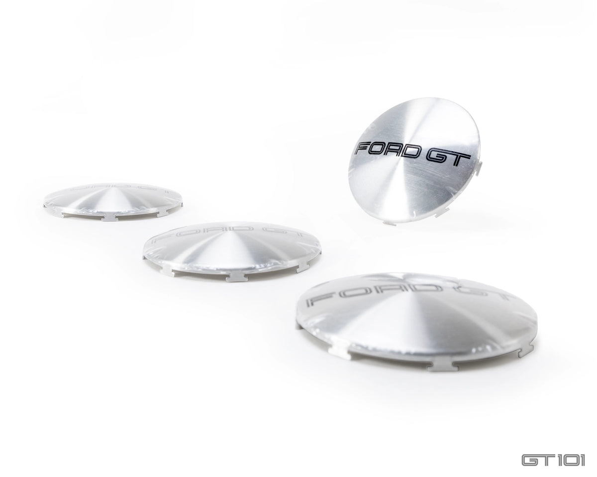 Set of four UK-manufactured aluminium replacement wheel centre emblems for optional 2005–2006 Ford GT BBS lightweight alloy wheels.