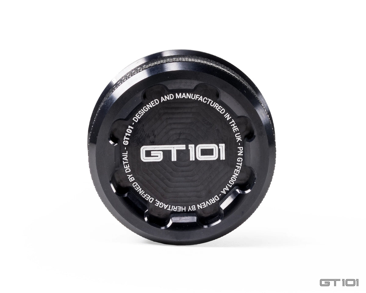 GT101 billet aluminium brake fluid reservoir cap for Ford Mustang S550 and S650, black anodised with knurled grip and engraved GT101 logo