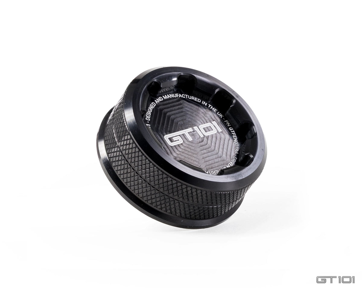 GT101 billet aluminium brake fluid reservoir cap for Ford Mustang S550 and S650, black anodised with knurled grip and engraved GT101 logo